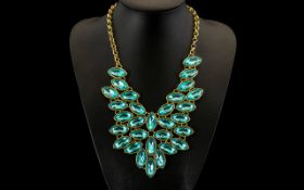 Swiss Blue Topaz Colour Crystal Large Bib Necklace, fully articulated V shaped bib of marquise shape