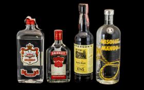 Collection of Spirits comprising Absolut Mango Vodka 1 litre; Smirnoff 350 ml Vodka; Smolenskoff