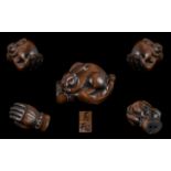 Japanese Nice Quality and Signed Carved Boxwood Netsuke, In The Form of a Large Hand Holding a Small