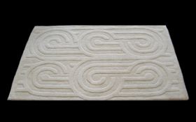 Cream Wool Jeff Banks Designer Rug measures approx 36'' x 60''. Cream with embossed pattern.