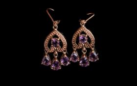 Rose de France Triple Drop Pendant Earrings, each stylish earring comprising three pear cut Rose