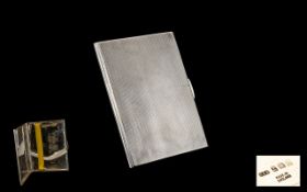 A Superb Quality Solid Silver Rectangular Shaped Engine Turned Cigarette Case. The Hinges are Made