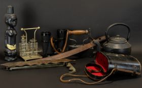 A Box of Interesting Oddments and Curios to include a short sword, a decanter marked Vudu, iron