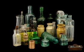 A Collection of Antique Bottles mostly medicine laboratory bottles. Includes poison bottles and