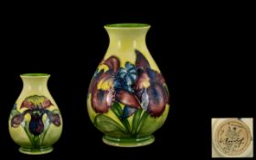 William Moorcroft Bulbous Shaped Vase of nice proportions. 'Orchids' Pattern on yellow ground. Label