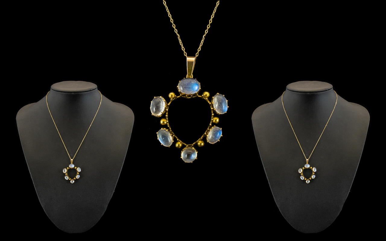 9ct Gold- Moonstone Set Circular Pendant of Attractive Form, Attached to a 9ct Gold Chain, Marked