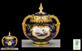 Coalport - Late 19th Century Hand Painted Triform Lidded Vase of Good Quality and Bulbous Form. With