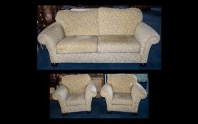 Three Piece Suite comprising a three-seater sofa and two armchairs,