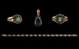 9 ct Yellow Gold and Mystic Topaz Single Stone Oval Cut Ring - Oval Topaz weight 4.448 cts. 12 mm