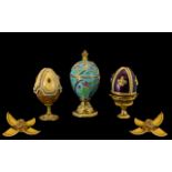 Collection of Faberge-Style Eggs, three in total,comprising beautiful Swarovski egg in dark plum