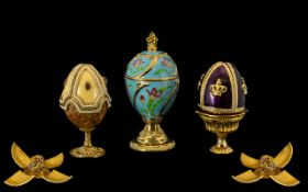 Collection of Faberge-Style Eggs, three in total,comprising beautiful Swarovski egg in dark plum