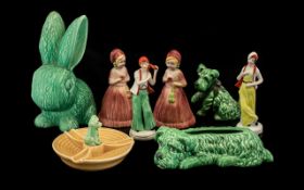 A Small Collection of Pottery to include four pieces of Sylvac - a dog and rabbit figure, a dog in