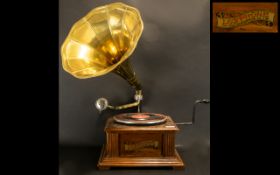 Vintage Gramaphone Player by Lodphone with brass trumpet horn. Wind up player, with oak case. Please