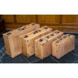 Set of Four Vintage Leather Suitcases by