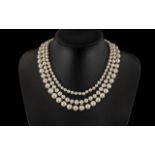 A Triple Strand Fresh Water Pearl Neckla