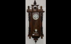 A Late 19thC Vienna Wall Clock white ena