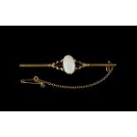 An Antique 9ct Gold Bar Brooch set with