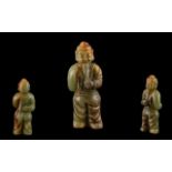 A Chinese Jadeite Stone Carved Figure. H