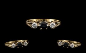 9ct Gold Attractive 3 Stone Diamond & Sapphire Set Dress Ring. Full hallmark for 9.375. The two