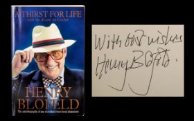 Signed Henry Blofeld Autobiography 'A Thirst For Life'. Paperback signed 'With best wishes, Henry