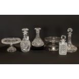 Collection of Four Decorative Cut Glass Decanters comprising one square, one bell shaped, one oval