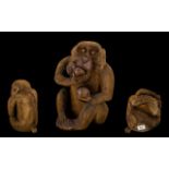 Japanese Large and Impressive Meiji Period Finely Carved Boxwood Seated Monkey Figure eating a peach