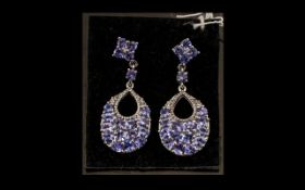 Tanzanite Ovoid Cluster Drop Earrings, 6.5cts; each earring having an ovoid, basket shaped cluster