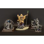 A Collection of Tudor Mint Myth and Magic Figures (4)collectable figurines in boxes consisting of