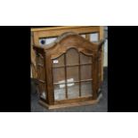 Oak Wall Mounted Bow Front Display Cabinet with glass front and three interior shelves. Arched top