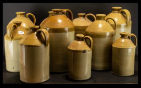 Collection of Ten Late 19thC Stoneware Cider Barrels. Various sizes. The tallest measuring 16 inches