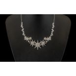 Swarovski Crystal & Rhinestone Necklace with three central star shapes surrounded by smaller
