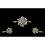 18ct Gold Attractive Diamond Set Cluster Ring Flowerhead setting. Full hallmark for 18ct. The