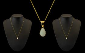 9ct Gold Opal Pendant & Chain. 9ct gold opal pendant suspended on a 9ct gold chain, please see