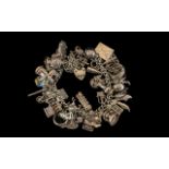 Good Quality Silver 1970's Curb Bracelet - Loaded with 40 Silver Charms. Some nice quality Silver