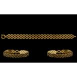 Ladies Nice Quality 9ct Gold Panther Bracelet of pleasing design. Fully hallmarked for 9.375. All