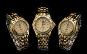 Tag Heuer Ladies Professional 200m Date Just Gold Plated on Steel Wrist Watch Model No. 5170. Tag