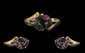 Ladies Attractive Contemporary 9ct Gold Mystic Topaz And Diamond Set Dress Ring marked 9.375, mystic