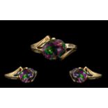 Ladies Attractive Contemporary 9ct Gold Mystic Topaz And Diamond Set Dress Ring marked 9.375, mystic