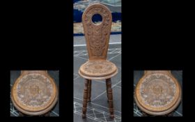 Oak Milking Chair / Stool. Highly carved decoration throughout, total height 33.5 inches, seat