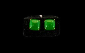 Jade Square Cut Solitaire Stud Earrings, each earring comprising a solitaire, square cushion