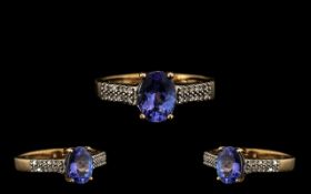 Ladies 9ct Gold Nice Quality Tanzanite and Diamond Set Dress Ring full hallmarks for 9ct. The oval