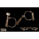 Victorian Period British Pair of Hiatt 1965 Non Adjustable Darby Handcuffs having a single locking