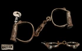 Victorian Period British Pair of Hiatt 1965 Non Adjustable Darby Handcuffs having a single locking