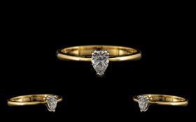 Contemporary Designer 18ct Yellow Gold Superb Single Stone Pear Shaped Diamond Ring marked 750-18ct.