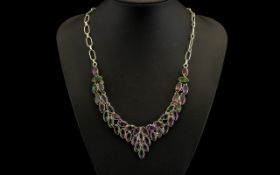 An Attractive And Impressive Sterling Silver Statement Necklace set with mystic topaz. Marked 935