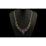 An Attractive And Impressive Sterling Silver Statement Necklace set with mystic topaz. Marked 935