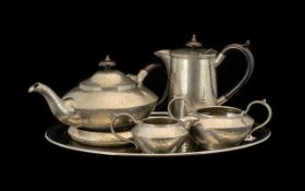 Pewter Tea Service by John Turton comprising Tea Pot & Stand No. 0620, Hot Water Pot No. 0628,