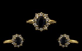 18 CT Gold Attractive Diamond & Sapphire Set Cluster Ring Flowerhead setting. The central sapphire