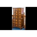 A Mid to Late 20thC Mahogany Chest on Chest - two short above six graduating long drawers. Raised on