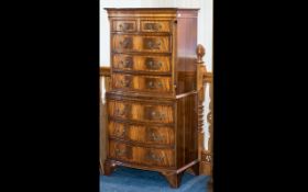 A Mid to Late 20thC Mahogany Chest on Chest - two short above six graduating long drawers. Raised on